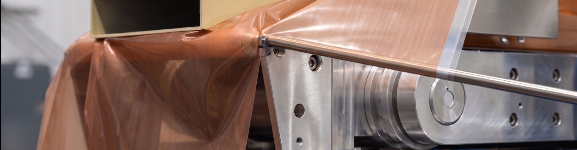 Sublimation film being drawn over an extrusion